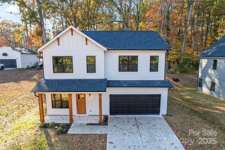 Front exterior of a new home in , Charlotte, NC, highlighting curb appeal (Image 2). Front exterior of a new home in , Charlotte, NC, highlighting curb appeal (Image 2).