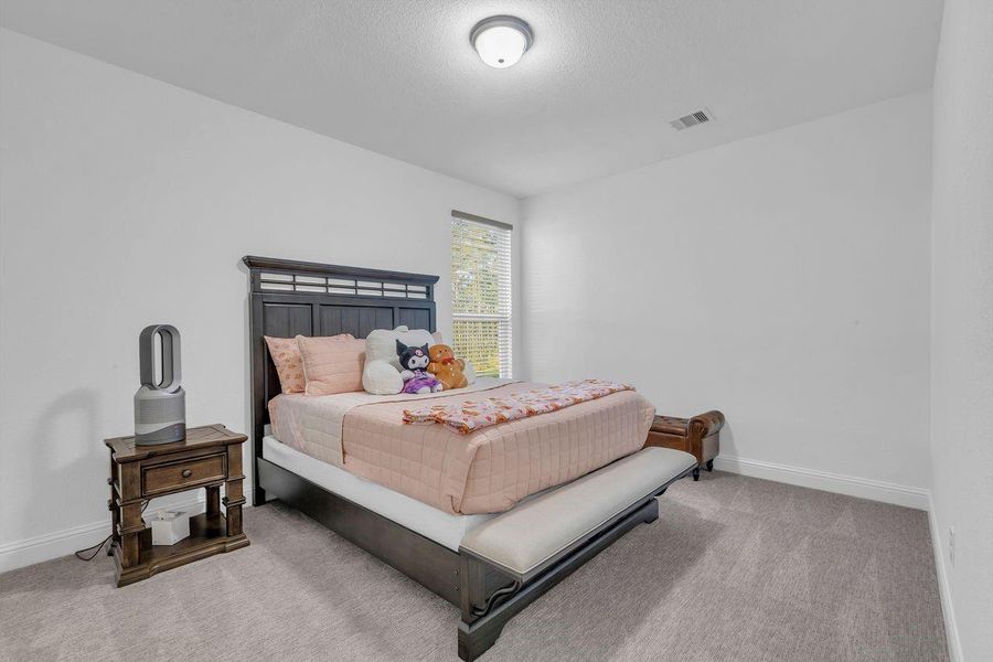 Furnished interior view inside a new home in The Highlands - 65', Porter (Image 10). Furnished interior view inside a new home in The Highlands - 65', Porter (Image 10).