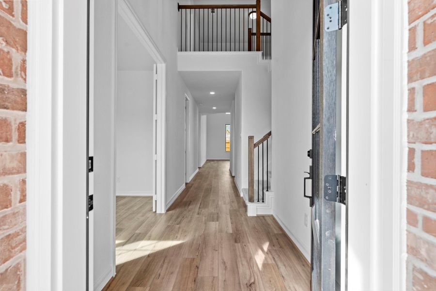 Welcome home! Step inside through the inviting entryway that seamlessly flows into the open-concept living space.