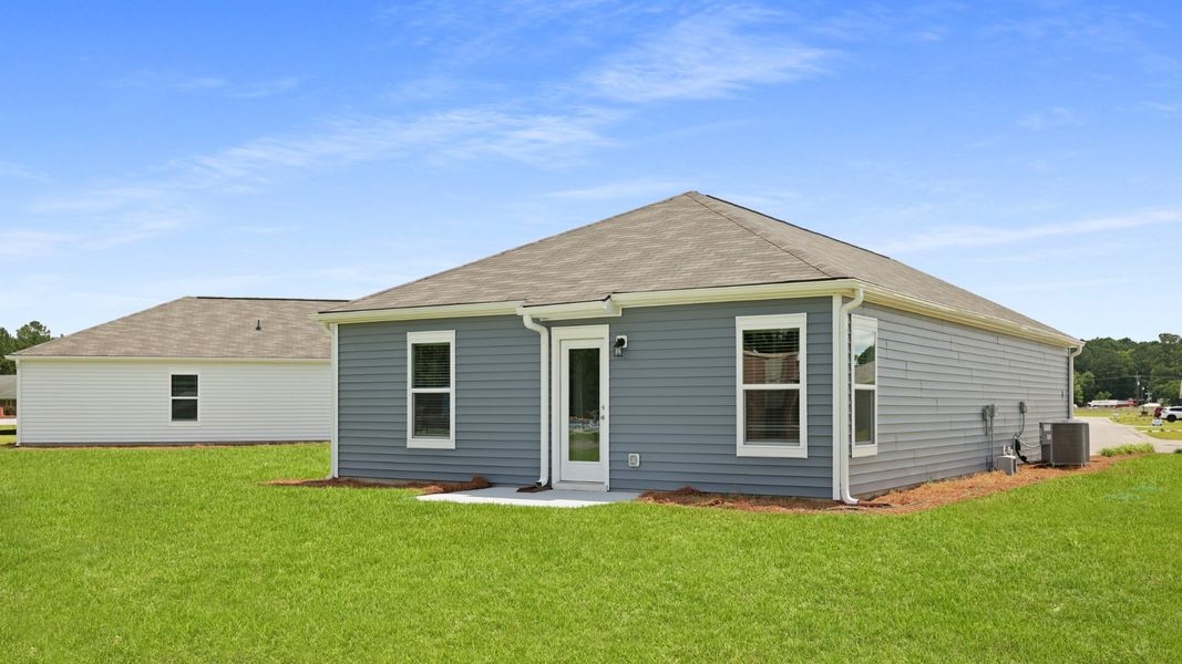 Front exterior of a new home in Evergreen, Holly Hill, SC, highlighting curb appeal (Image 18).