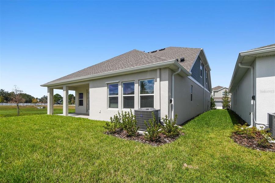 Exterior details and patio area of a home in The Peninsula at Rhodine Lake, Riverview (Image 3). Exterior details and patio area of a home in The Peninsula at Rhodine Lake, Riverview (Image 3).