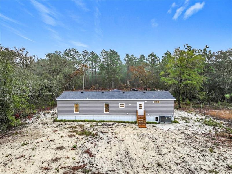 Exterior details and patio area of a home in , Hawthorne (Image 25).