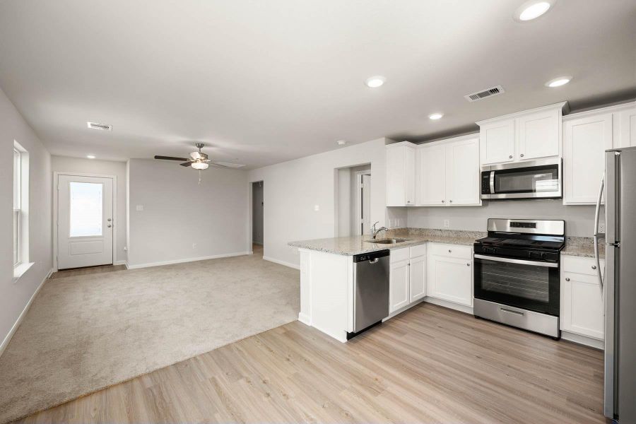 Furnished interior view inside a new home in Vacek Country Meadows, Richmond (Image 8).