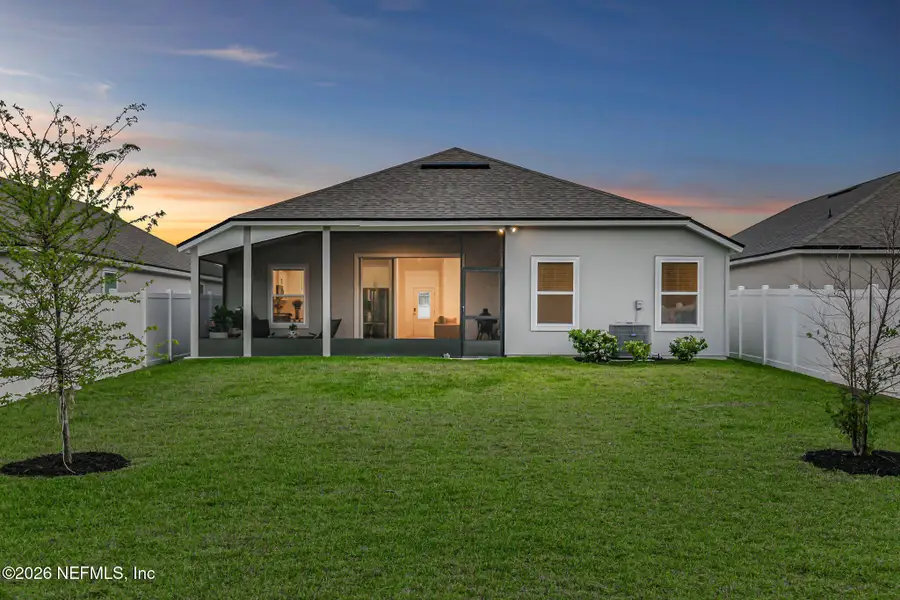 Exterior details and patio area of a home in Cross Creek, Green Cove Springs (Image 32).