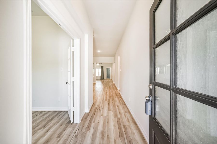 Welcome in! Step inside and fall in love with the designer paint and luxury vinyl plank flooring that flows throughout. To the left of the foyer is your private study, offering a quiet space for work or study. Welcome in! Step inside and fall in love with the designer paint and luxury vinyl plank flooring that flows throughout. To the left of the foyer is your private study, offering a quiet space for work or study.