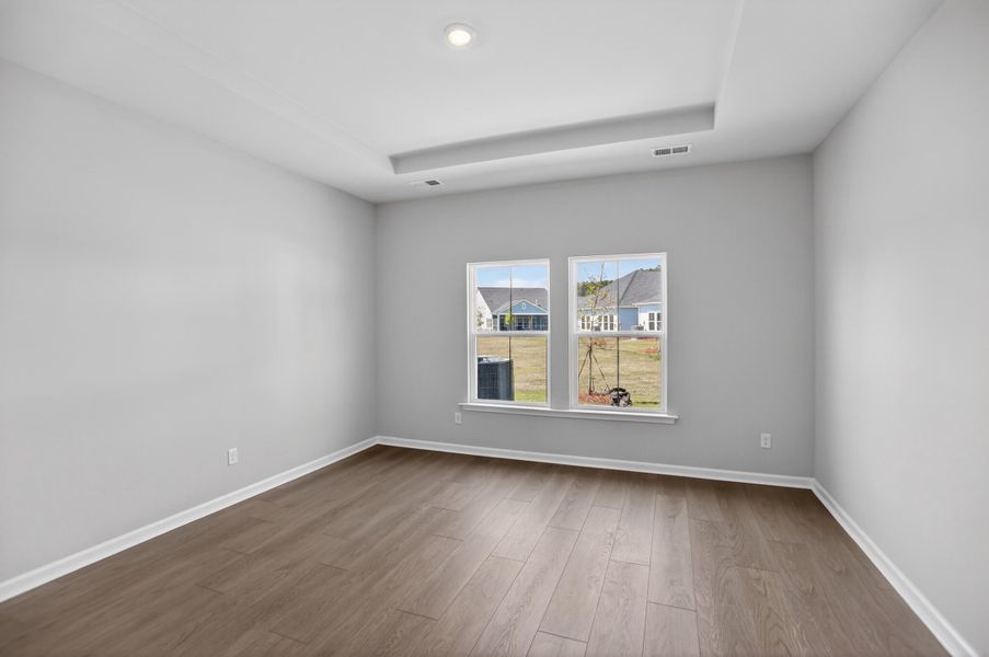 Spacious, unfurnished interior of a new home in Horizons at Carnes Crossroads | 55+, Summerville (Image 8).