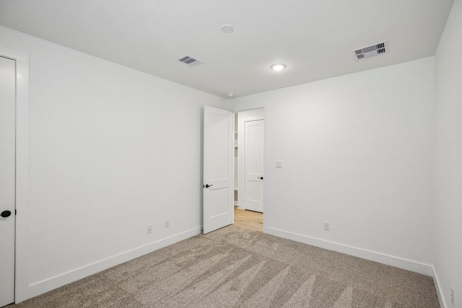 Spacious, unfurnished interior of a new home in Riceland 60',65',70', Old River-Winfree (Image 29).
