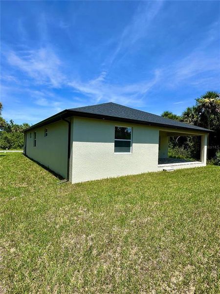 Front exterior of a new home in , Rotonda West, FL, highlighting curb appeal (Image 2).