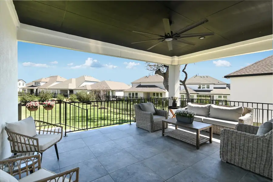 Appreciate this covered patio that provides protection from the sun or listen to the soothing rain during the next storm without getting wet.