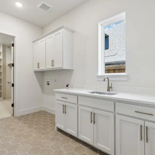 Furnished interior view inside a new home in StarView, Prosper (Image 36).