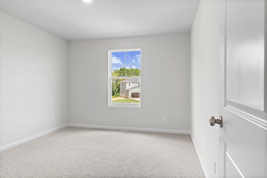 A room with a window and a door. A room with a window and a door.