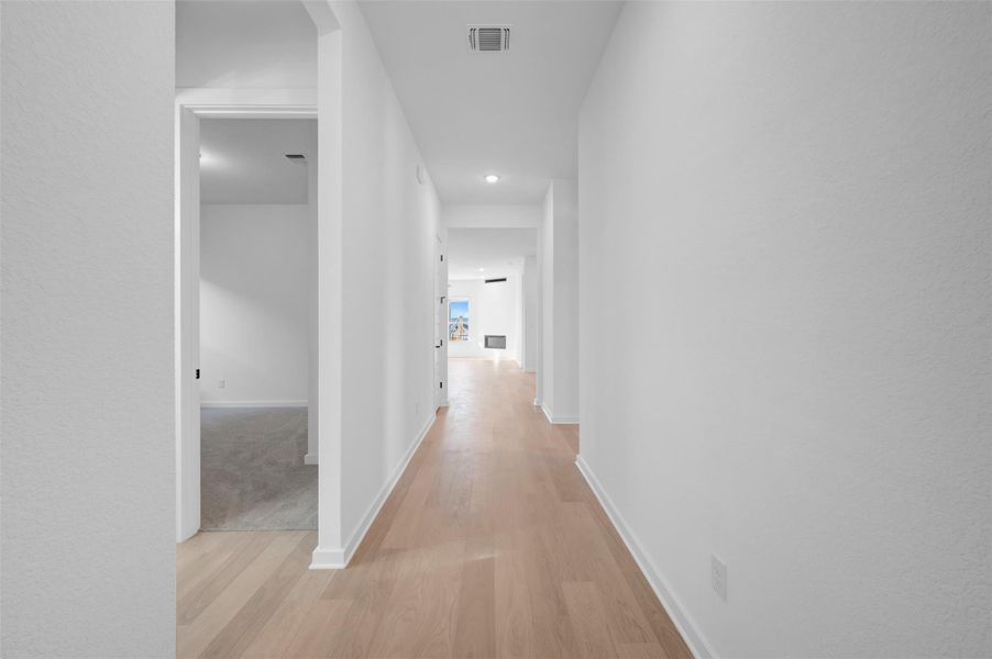 Spacious, unfurnished interior of a new home in Heritage, Dripping Springs (Image 36).