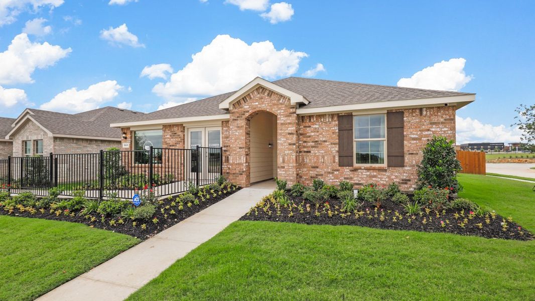 Front exterior of a new home in Meadowbrook Estates, Cleburne, TX, highlighting curb appeal (Image 2).