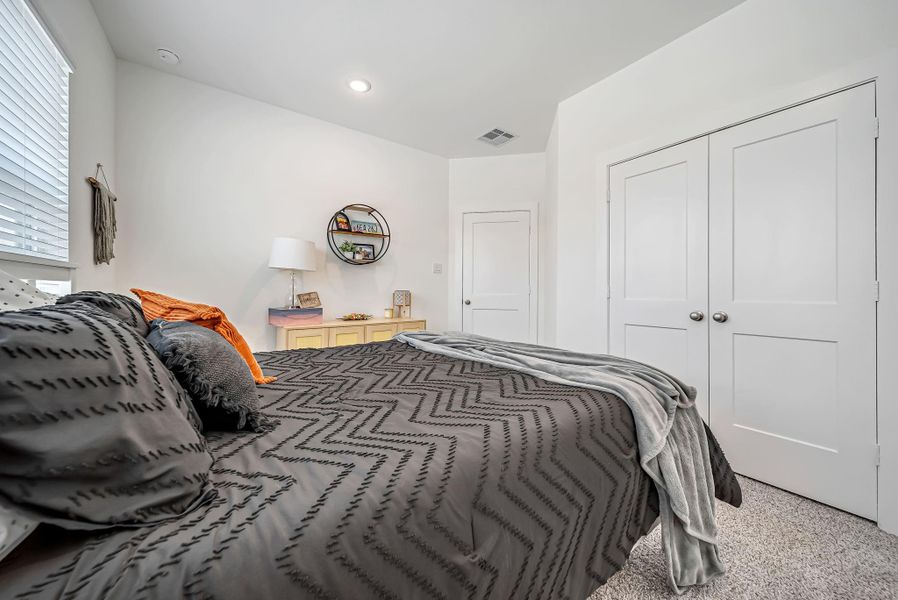 Furnished interior view inside a new home in The Groves, Humble (Image 9).
