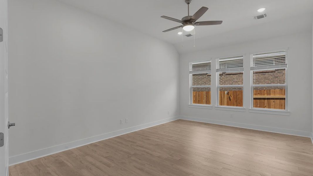 Representative unfurnished interior of a home built from the Mariah by Chesmar Homes in Crescent Bluff, Georgetown (Image 14).