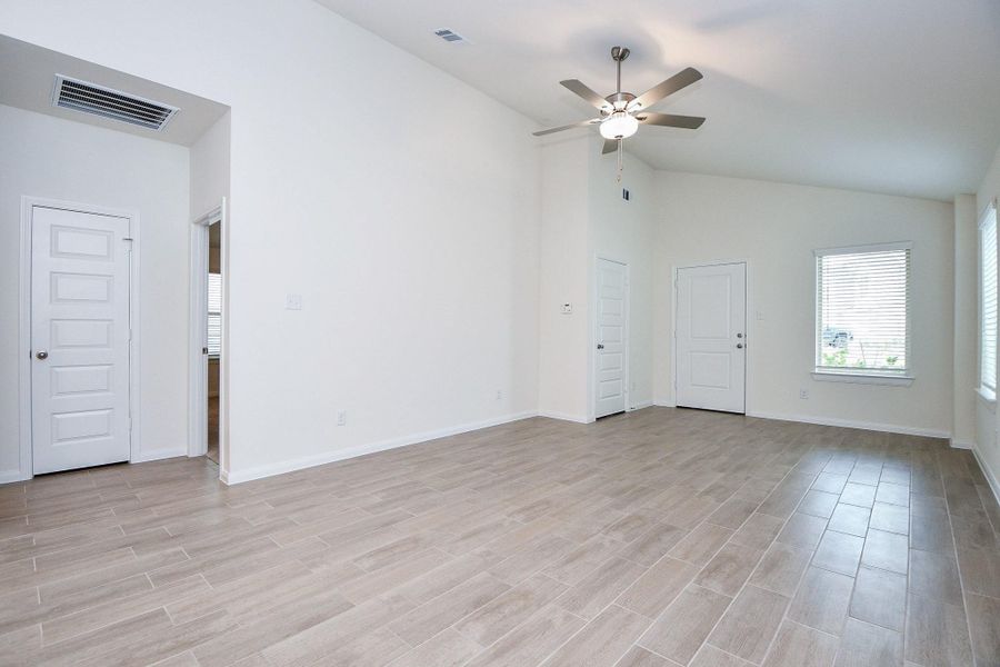 The living space is abundant of natural light because of the huge windows that are throughout the home.