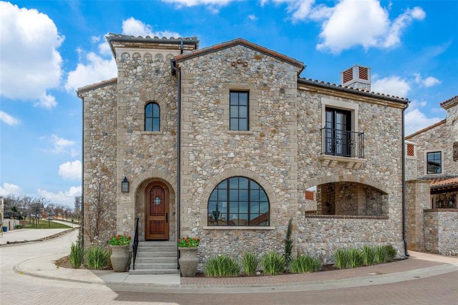 Mediterranean / spanish-style house featuring a balcony