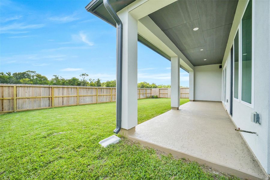 Exterior details and patio area of a home in Sienna 65', Missouri City (Image 4). Exterior details and patio area of a home in Sienna 65', Missouri City (Image 4).