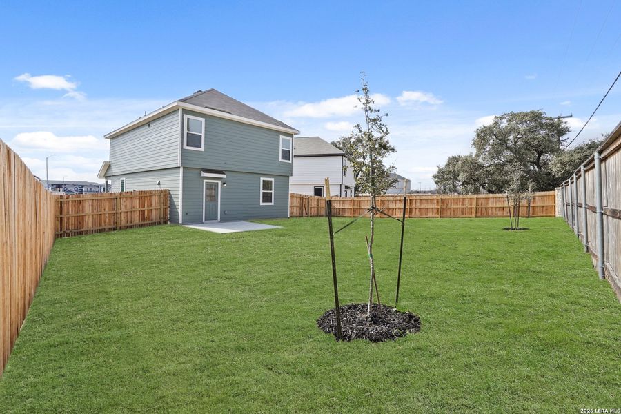 Exterior details and patio area of a home in Melissa Ranch, San Antonio (Image 19).
