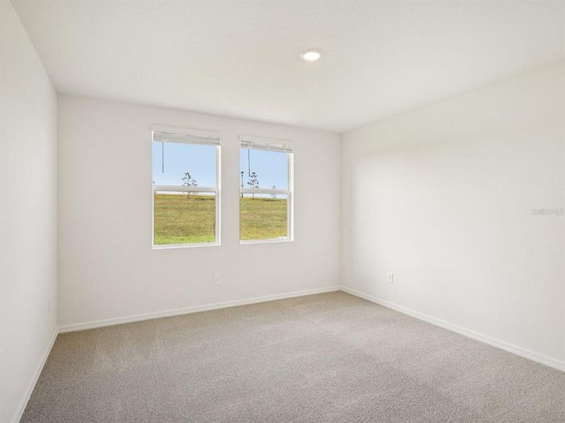 Spacious, unfurnished interior of a new home in The Reserve at Van Oaks, Auburndale (Image 26).