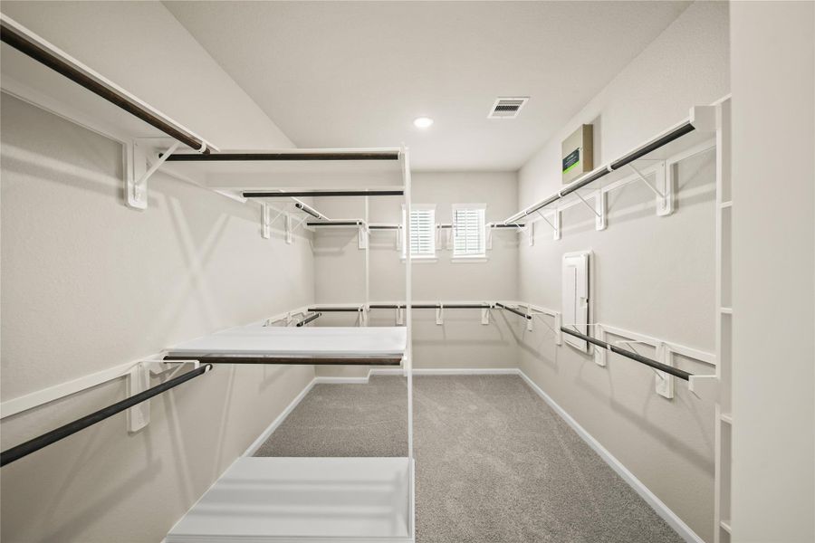 Primary walk-in closet (*Photo not of actual home and used for illustration purposes only.)