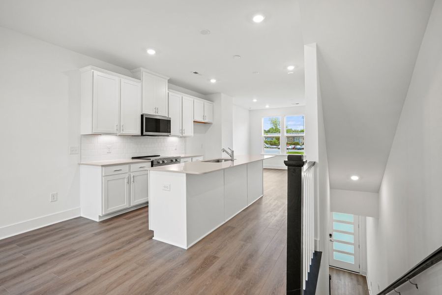 Furnished interior view inside a new home in West End Heights, Charlotte (Image 3).