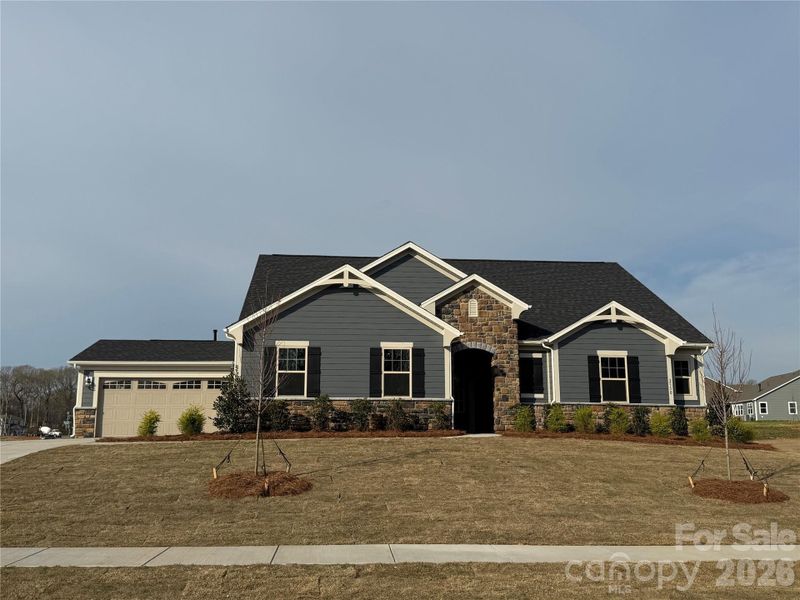 Front exterior of a new home in Blair Place, Monroe, NC, highlighting curb appeal (Image 15).