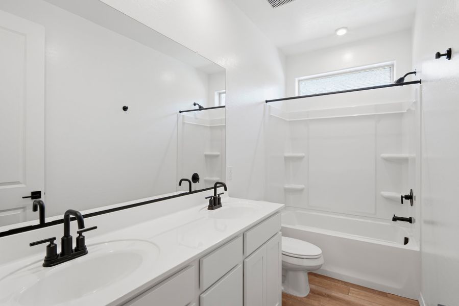 Furnished interior view inside a new home in Marbella at Windrose, Waddell (Image 14).