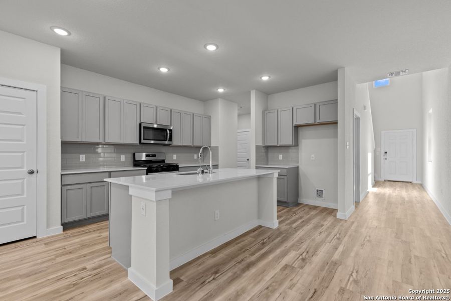 Furnished interior view inside a new home in Spring Creek, San Antonio (Image 5).