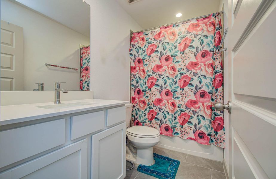 Furnished interior view inside a new home in Parks Edge, Missouri City (Image 16).