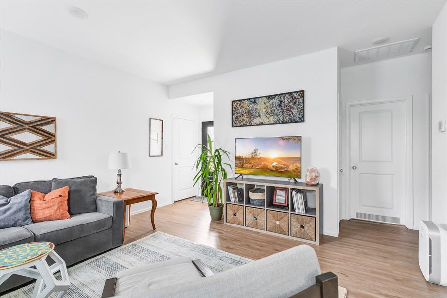 Family room view. Middle door is the secondary bathroom with the secondary bedrooms located on either side of the bath.
