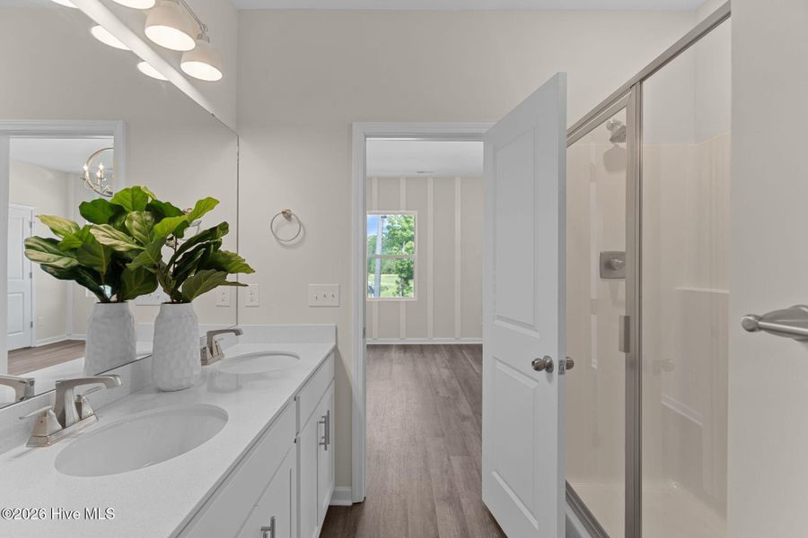 Furnished interior view inside a new home in Coastal Haven Townes, Leland (Image 7).
