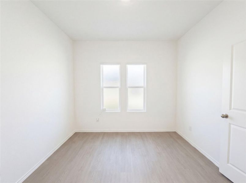 Spacious, unfurnished interior of a new home in The Colony, Bastrop (Image 17).