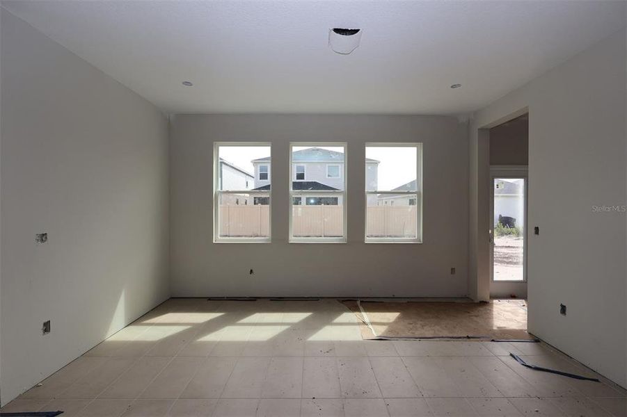 In-progress construction of a new home in Center Lake on the Park, St. Cloud, FL (Image 18).