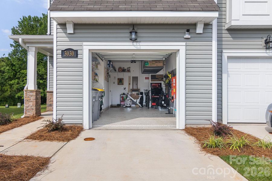 Exterior details and patio area of a home in Hedgecliff Townes, Concord (Image 4). Exterior details and patio area of a home in Hedgecliff Townes, Concord (Image 4).