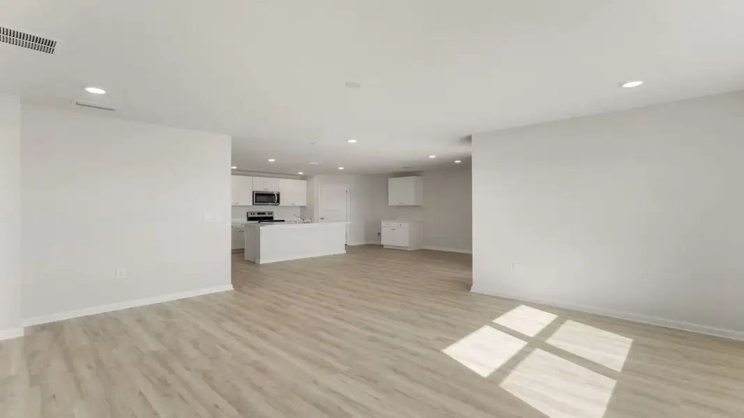 Spacious, unfurnished interior of a new home in Magnolia at the Bluffs Phase 3, Freeport (Image 15). Spacious, unfurnished interior of a new home in Magnolia at the Bluffs Phase 3, Freeport (Image 15).