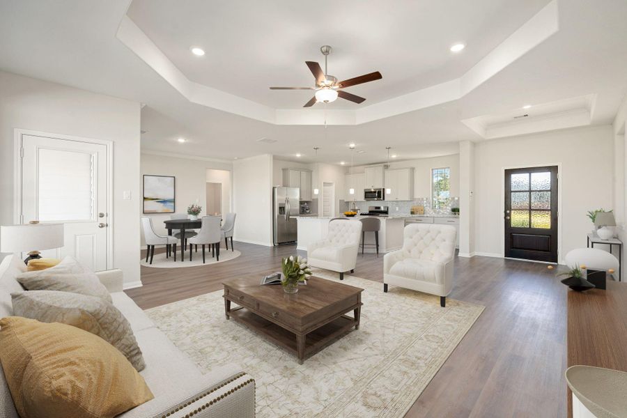This inviting living space is filled with natural light streaming through large windows, highlighting clean lines and a soft, neutral color palette. The open layout flows seamlessly into the kitchen and outdoor areas, creating a comfortable setting for everyday living. Sleek finishes and thoughtful design details give the room a bright, modern appeal, perfect for both relaxing and entertaining. This inviting living space is filled with natural light streaming through large windows, highlighting clean lines and a soft, neutral color palette. The open layout flows seamlessly into the kitchen and outdoor areas, creating a comfortable setting for everyday living. Sleek finishes and thoughtful design details give the room a bright, modern appeal, perfect for both relaxing and entertaining.