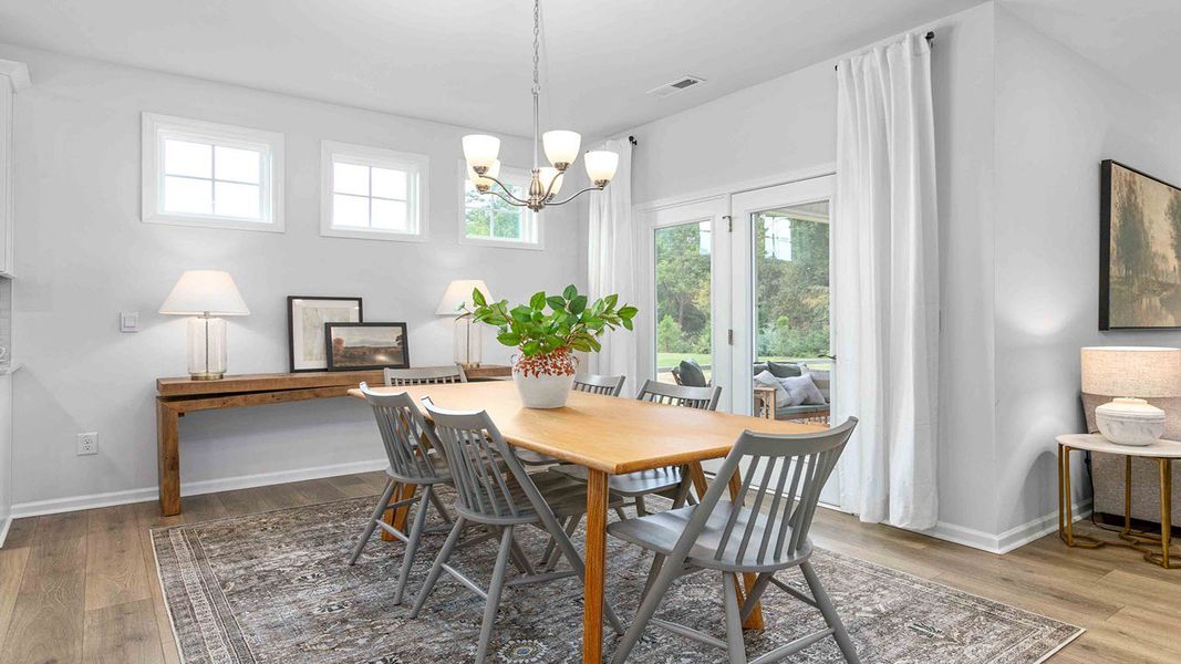 Furnished interior view inside a new home in The Villas at Kinsley, Jamestown (Image 15).