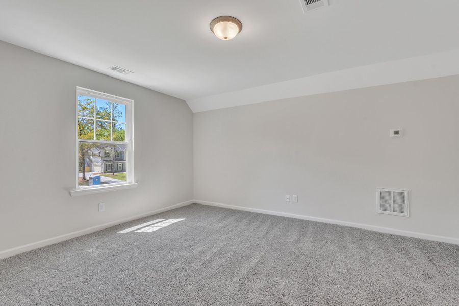 Representative unfurnished interior of a home built from the The Camilla + Bonus Room by Smith Family Homes in Ramsey Landing, Rincon (Image 21).