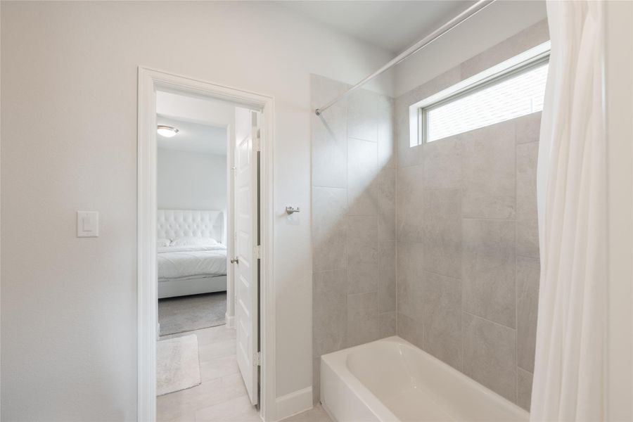 Furnished interior view inside a new home in Elyson, Katy (Image 43).