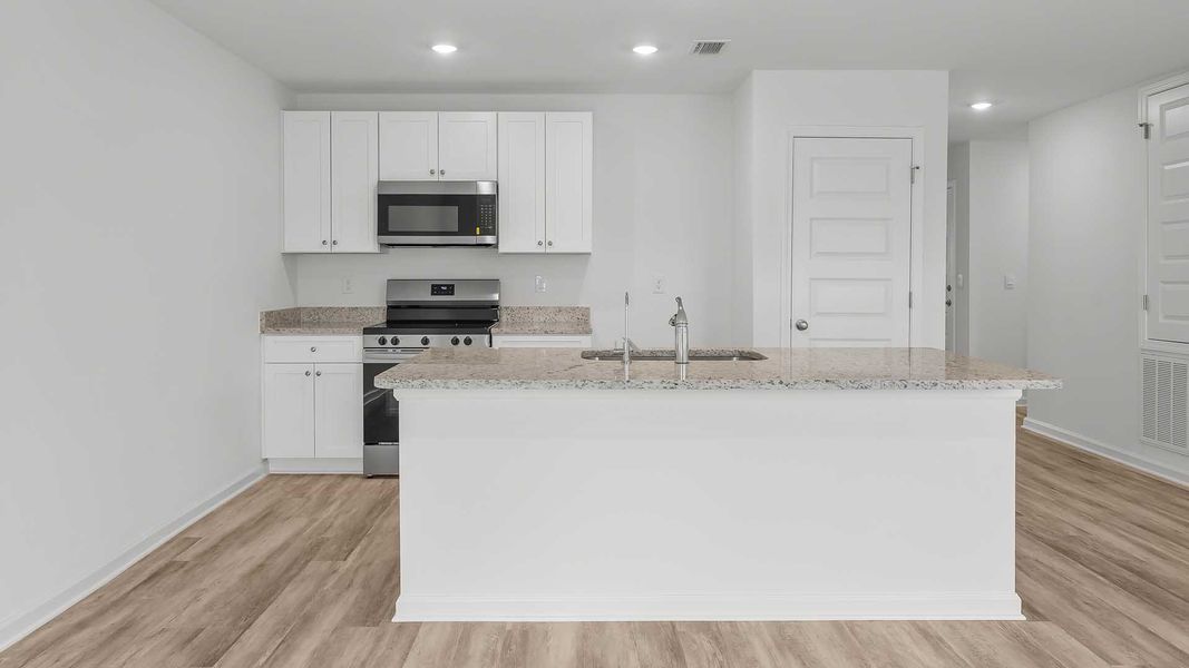 Furnished interior view inside a new home in Sunny Hills, Chipley (Image 6).