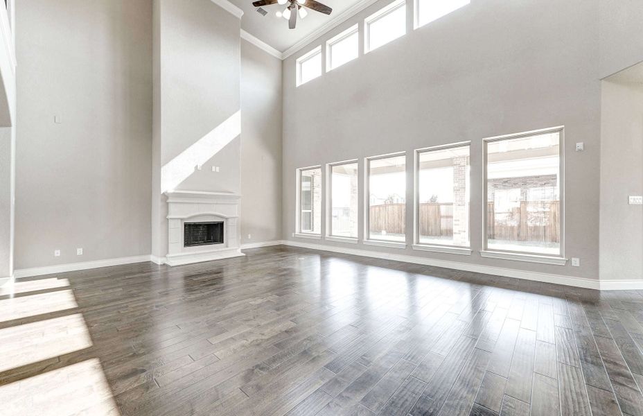 Representative unfurnished interior of a home built from the 4590 by Ravenna Homes in Artavia 70′, Conroe (Image 19).