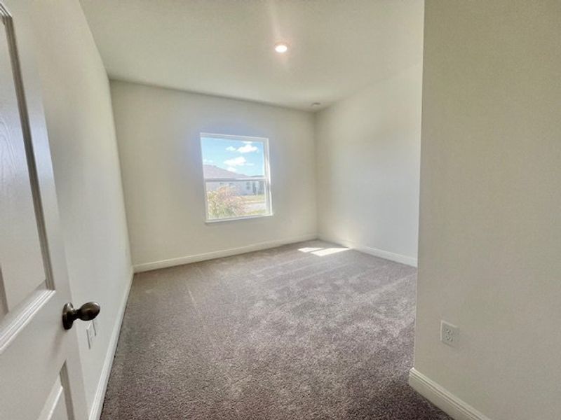 Spacious, unfurnished interior of a new home in Lakes At St Sebastian, Micco (Image 14).