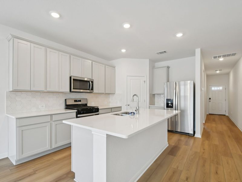 Furnished interior view inside a new home in Waterstone Crossing, Kyle (Image 3).