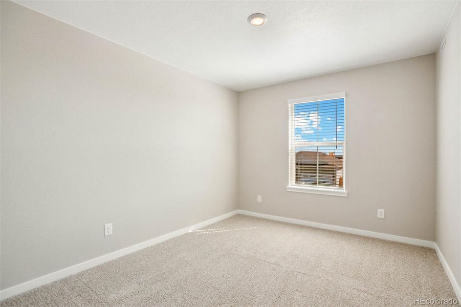Spacious, unfurnished interior of a new home in Second Creek Farm, Commerce City (Image 8).