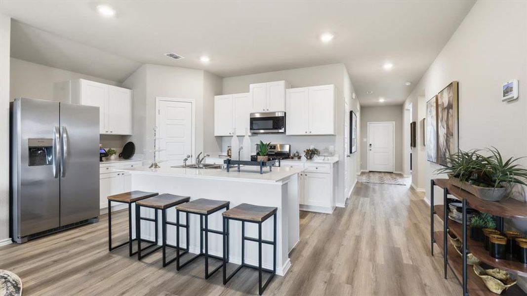 Kitchen - All Home and community information, including pricing, included features, terms, availability and amenities, are subject to change at any time without notice or obligation. All Drawings, pictures, photographs, video, square footages, floor plans, elevations, features, colors and sizes are approximate for illustration purposes only and will vary from the homes as built.