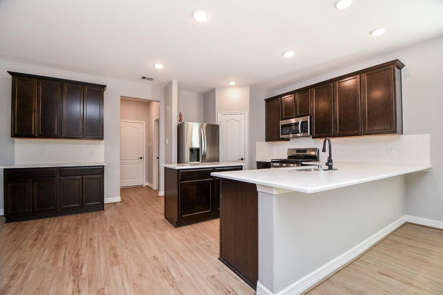 Furnished interior view inside a new home in , Tomball (Image 9). Furnished interior view inside a new home in , Tomball (Image 9).