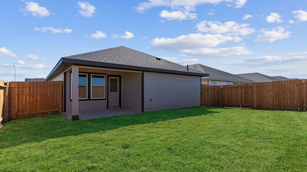 Exterior details and patio area of a home in August Trails, Needville (Image 19).