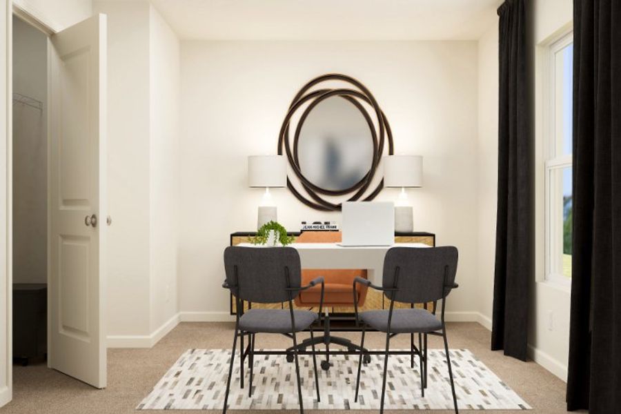 A dining room table with chairs.