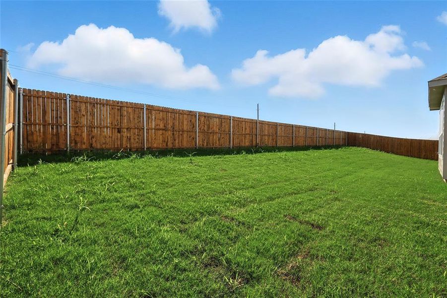 Exterior details and patio area of a home in Pebblebrook, Sherman (Image 4).
